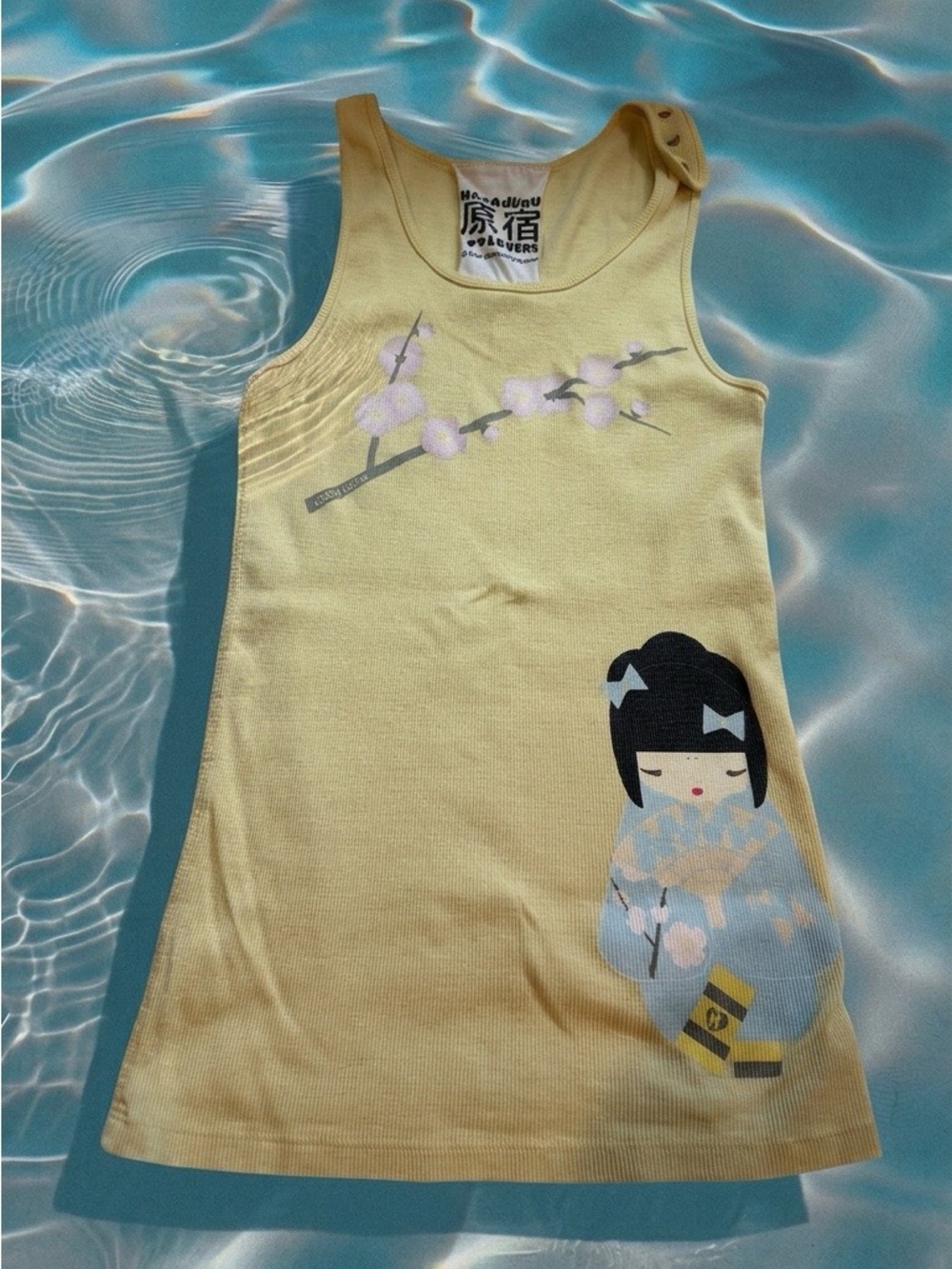 Wine Yellow Sleeveless Dress Top with Kokeshi Doll Graphic